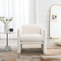 Armchair with wavy armrests